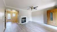 Living Room photo: Freshly painted with new LVP flooring.