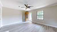 Living Room photo: Freshly painted with new LVP flooring.