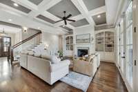 As you look from the kitchen to the great room, a coffered ceiling tops off the upscale appearance  of this comfortable space.