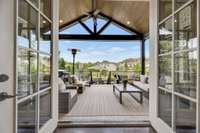 In the downstairs great room, two French doors lead to a wonderful outdoor space and backyard.