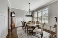 This room receives an abundance of natural light from the triple windows on the southern side of the home.