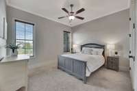 This bedroom is ideal for house guests and has easy access to a bathroom, the kitchen and the breakfast nook.