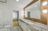 Jack & Jill bathroom with a custom extra large stone vanity!