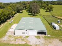 7,000 sq. ft. Shop with front and rear overhead bay doors