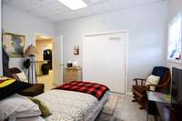 Bedroom with laundry closet