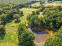 Enjoy picturesque ponds dotted throughout the property.