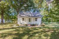 This charming property includes a 3 BR/1 bath farmhouse that exudes rustic charm.