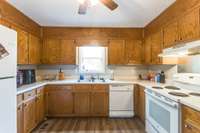 The functional kitchen has ample storage and counterspace.