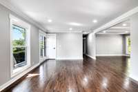 View off dining area to entry. New windows throughout home with lifetime transferable warranty.