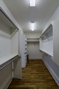 Huge primary closet with easy access to the laundry room.