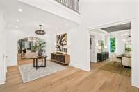 View through the foyer to the formal dining room on the right.