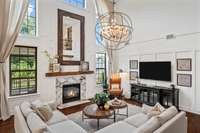 Large Restoration Hardware mirror over the fireplace conveys!