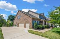 3 car side entry garage with plenty of space for additional parking.