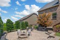 Another view of the paver patio and mature landscaping.