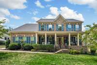 Large front porch, brand-new wood door, and a large lot!