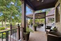 This dreamy patio area is a wonderful place to enjoy.  The whole area is fully fenced and offers two separate covered areas, plenty of seating options and gorgeous views!