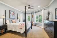 One of three spacious ensuite bedrooms upstairs.  This one overlooks the gorgeous backyard, and rolling hills beyond.