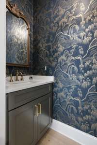 Beautiful designer wallpaper in the powder room