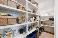 Walk-in pantry provides additional storage.