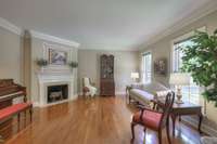 Front sitting room with wood burning fireplace