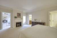 Wood burning fireplace in the primary bedroom