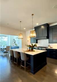 Open Kitchen with Island Seating and Walk In Pantry!  (Professional photography coming soon)