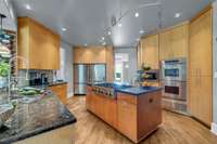 This stylish, modern chef's kitchen fits just as well in a New York Penthouse as it is in a custom Kingston Springs home.