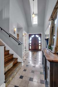 The ceilings in the main entry tower above you here making this a grand entrance.