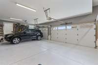 The garage features insulated garage doors and a mini split unit that heats & cools the garage area.