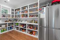 Pantry has an additional refrigerator. Electrical outlets throughout built-ins for appliances. *Not pictured is more storage which is great for cleaning supplies*