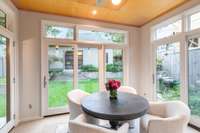 Breakfast room with temperature controlled travertine floors.