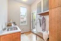 Mud room drop zone with plenty of built in storage. Has room for W/D to be 2nd laundry room.