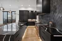 Quartz counter tops and top-of-the-line Fisher & Paykel appliances