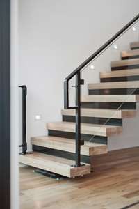 Floating staircase with custom baby gate