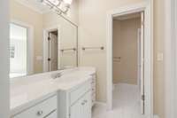 Vanity is separate from water closet and bathtub