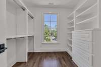 Fantastic walk-in closet with built-ins and custom cedar closet.