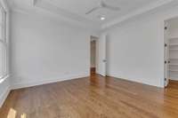 Two of the three upstairs bedrooms with walk-in closet.