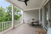 Covered balcony overlooking the garden and Harpeth River.