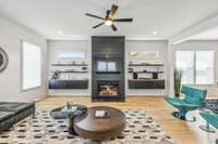 Gas fireplace with logs installed. A flip of the switch starts the fire. Custom shelving with storage installed.