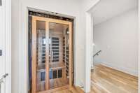 Close up of sauna. Original doors are there on either side of sauna. Ready to go as closet again. Its across from full bath and beside the 4th bedroom being used as home gym.