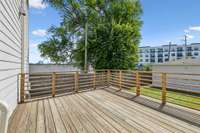 Good sized deck for entertaining. Just off mud room.