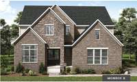 This photo represents the B elevation of brick and stone, showing the windows on a side-entry garage.