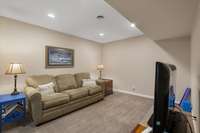 This lower level room is a great TV/Gaming space and could also serve as an exercise room or office