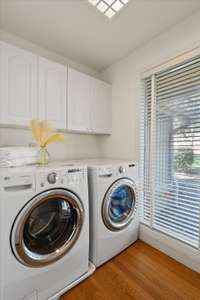 The Main Floor Laundry Room has a utility sink and closet (or 2nd pantry!)