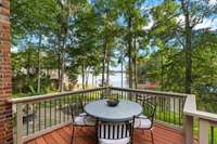 From the Great Room to this spacious 37' long deck with peaceful views of the cove and main channel