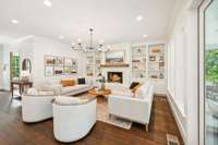 Main floor living room with built-ins and fireplace.