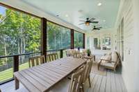 Screened porch overlooks the back yard.