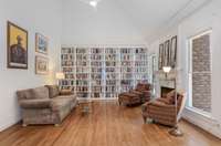 I absolutely love this family room - the bookshelves can be removed in sections if you like or, if you are book lovers like the sellers, they are beautiful display pieces.