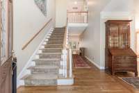 The moment you enter the two-story foyer, the charm of the home is evident.  Newly refinished hardwood floors shine throughout the main level.