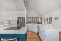 A sneak peek into the family room beyond the kitchen but do you see all of this counter prep space?